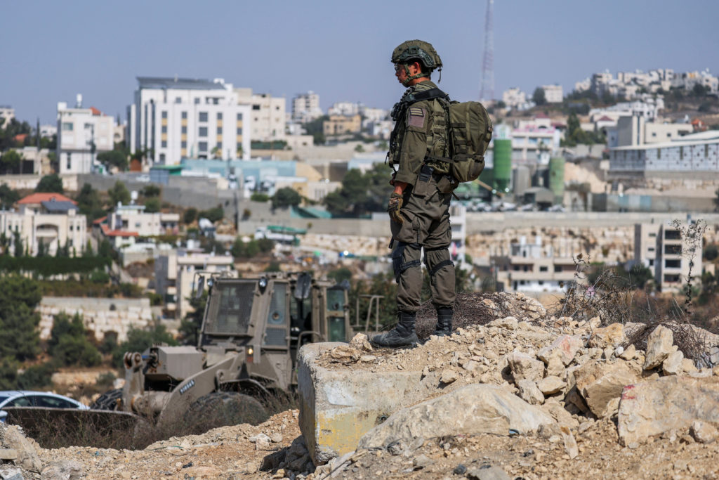 Israeli military says 2 soldiers were killed in the West Bank attack that also left 2 gunmen dead