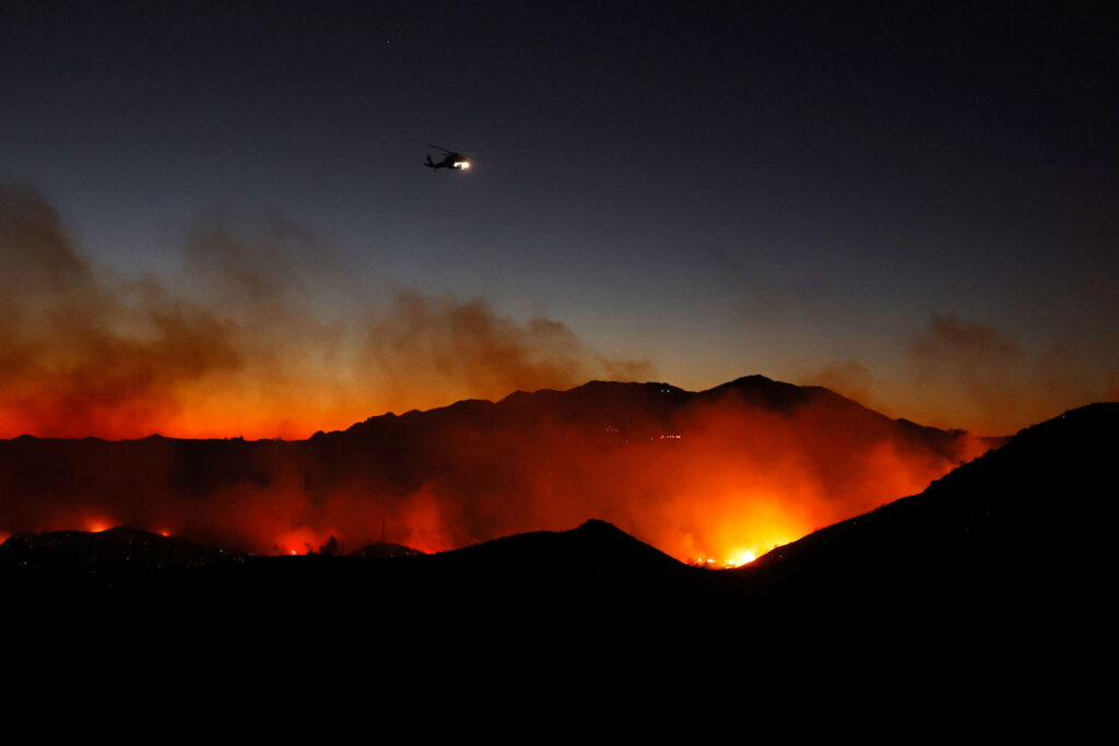 Malibu wildfire rages, triggering evacuations in Southern California