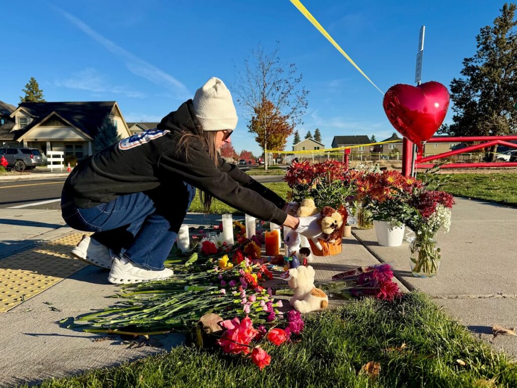 Man stopped the Oregon elementary school shooter has 2 daughters at the school, his mom says