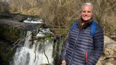 Man, 61, charged with murder after 'stabbed' woman dies following crash