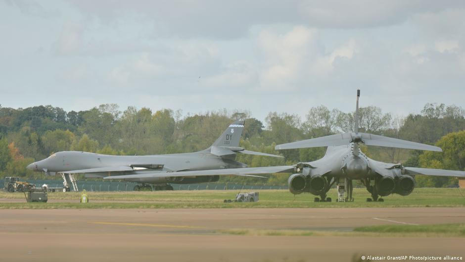 Two men face UK national security charges following an incident near RAF Fairford, with police suspecting Iranian state involvement