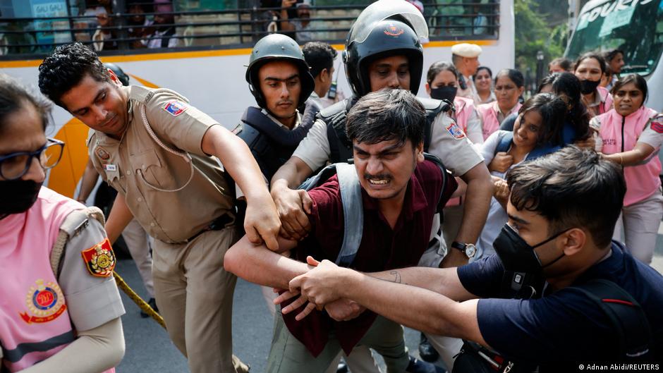 Indian police crack down on 'Cockroach' protesters in Delhi