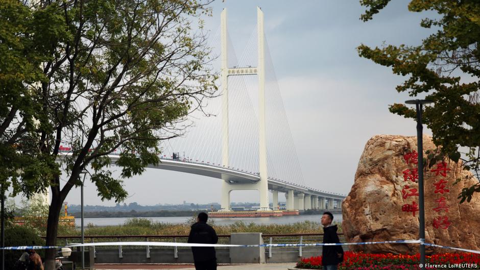 North Korean leader Kim Jong Un travels to Chinese border city via newly opened bridge