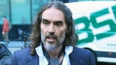Russell Brand says allegations had devastating impact on him