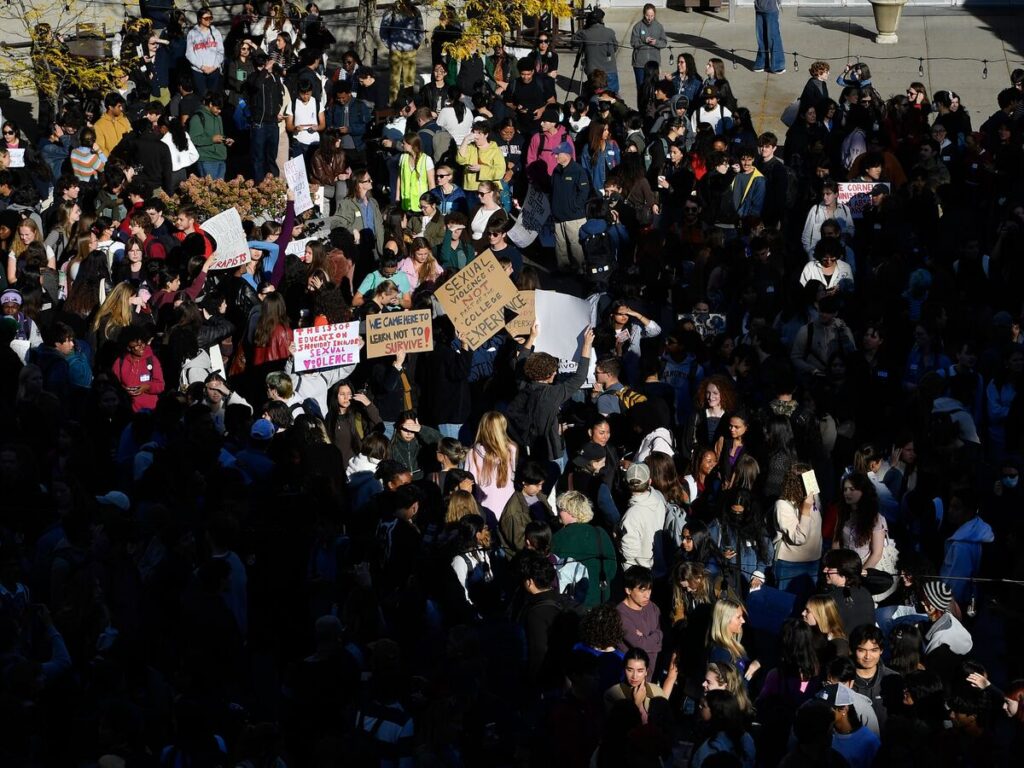 A crowd of students protests Cornell's response to gang rape complaint