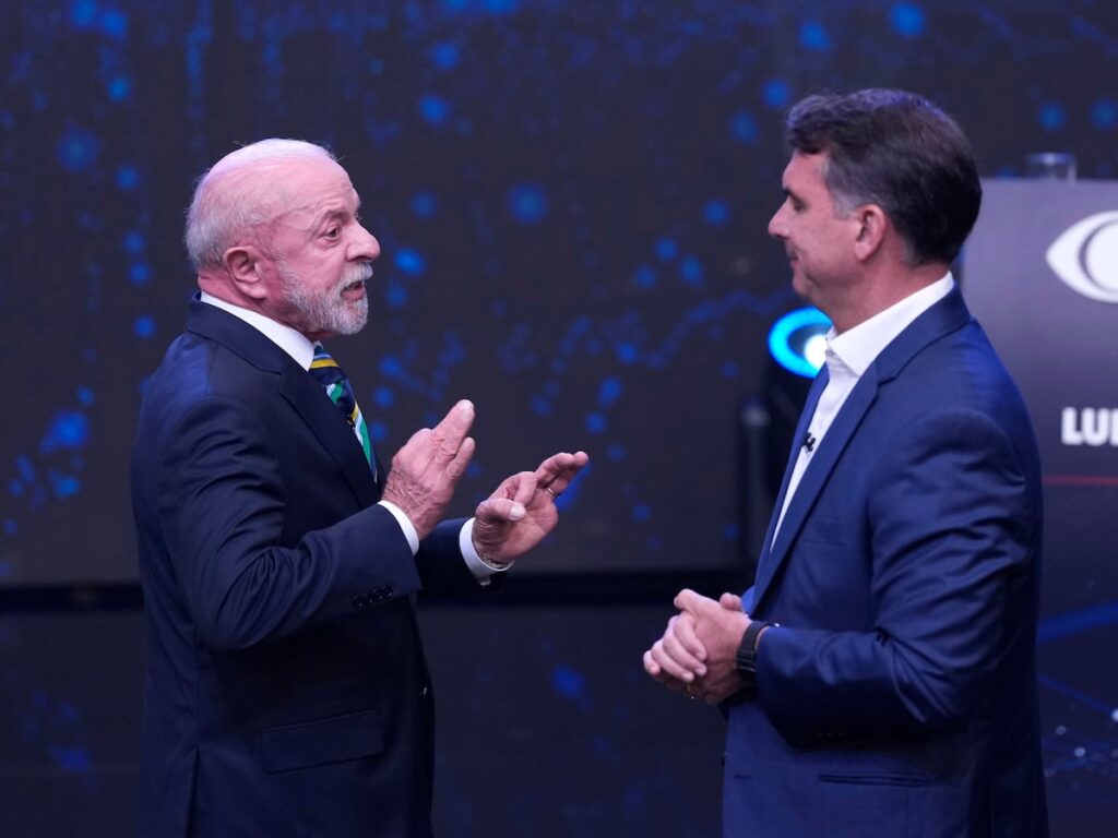 Brazil's Lula and Flávio Bolsonaro trade barbs in 1st debate only days before presidential runoff