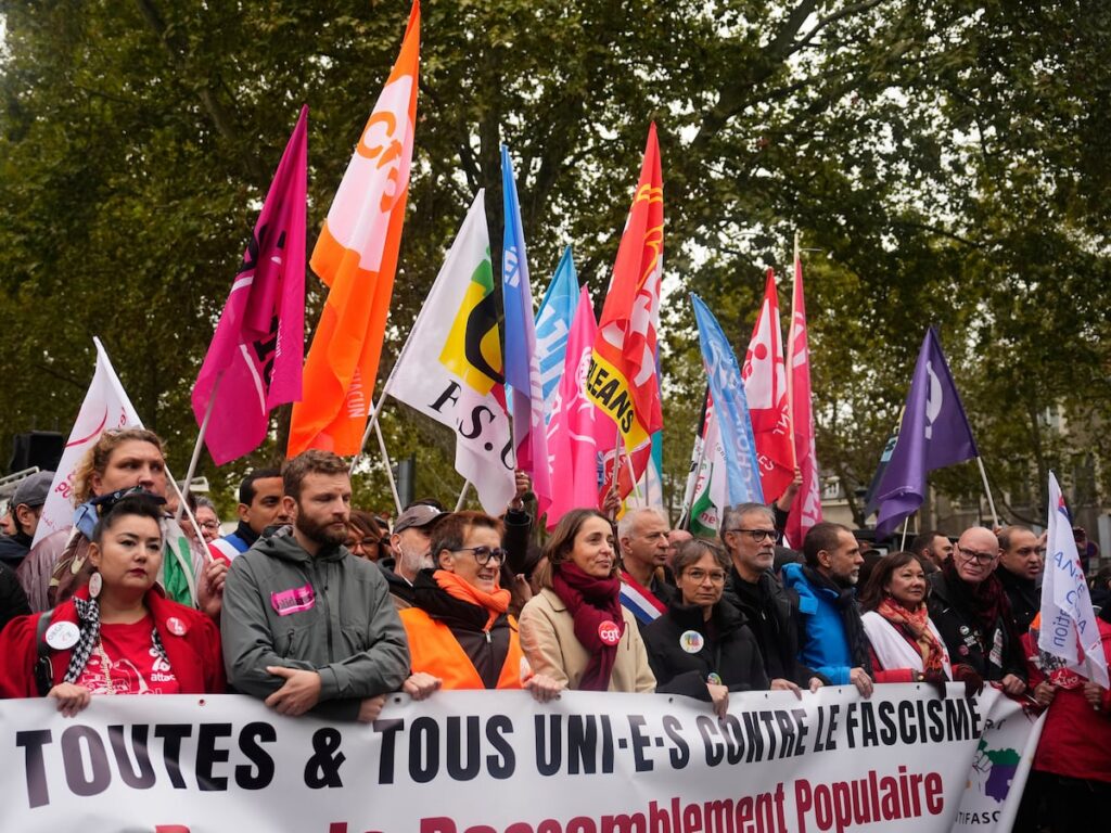 France deploys thousands of police as Paris march is restricted to city’s edge