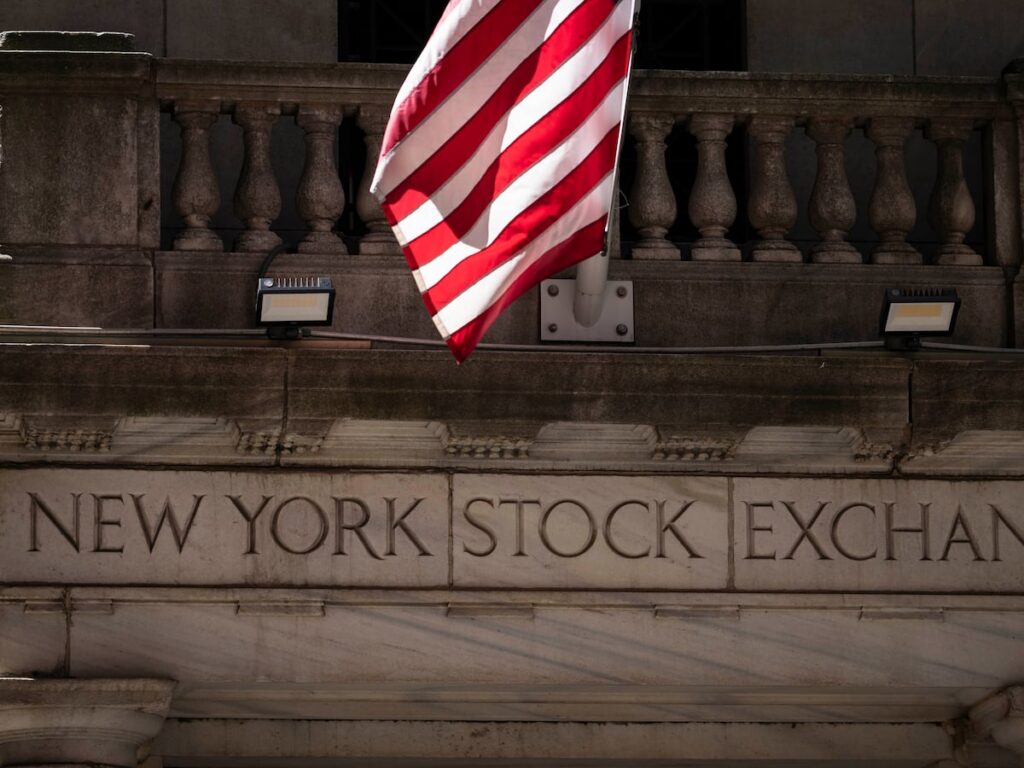 Wall Street retreats from its record with oil prices still elevated