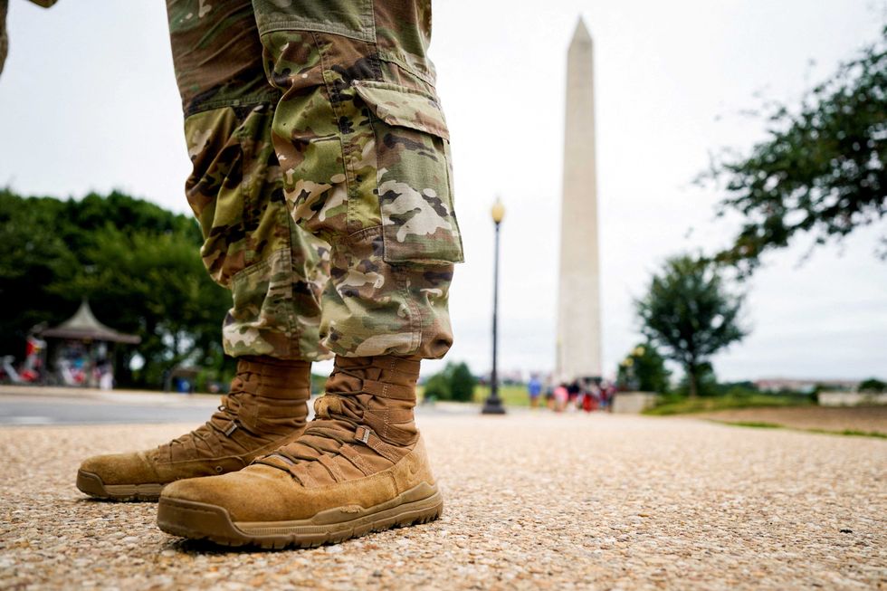 National Guard breaks silence as alarms blare over troops near D.C. ballot box