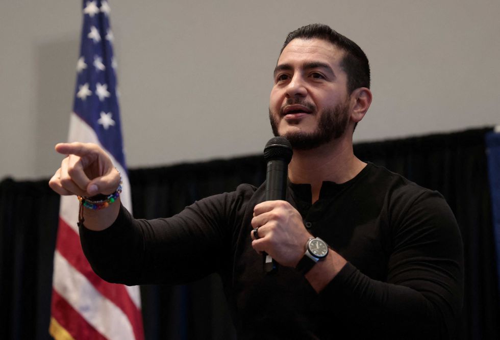 Cheers as Abdul El-Sayed schools 'bigoted Islamophobic heckler' at tense town hall