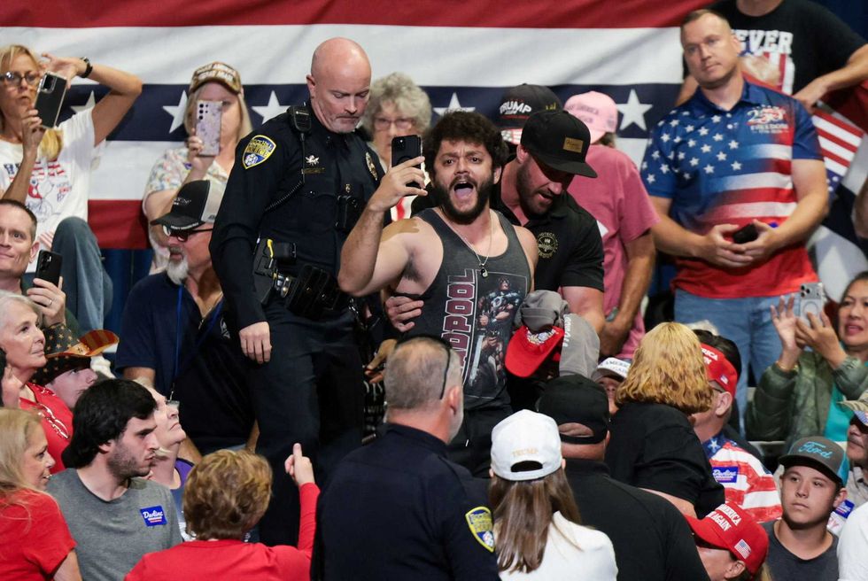 Trump erupts after ‘sloppy-looking’ protester dragged out of rally: 'They're all losers!'