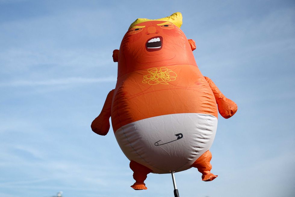 Frantic push mobilizes millions of long-dormant overseas voters enraged by Trump