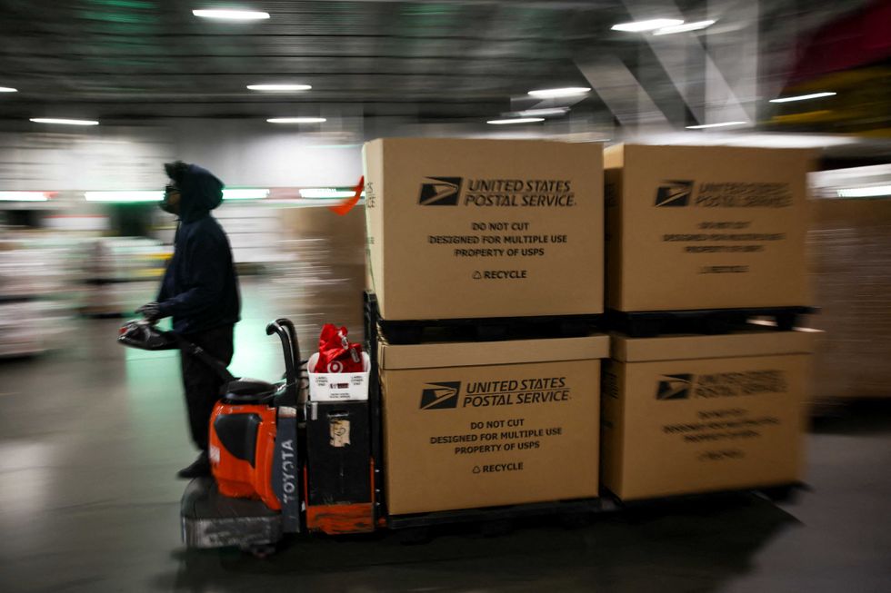 Fears swirl as armed guards swarm USPS weeks before midterms: 'Really suspicious'