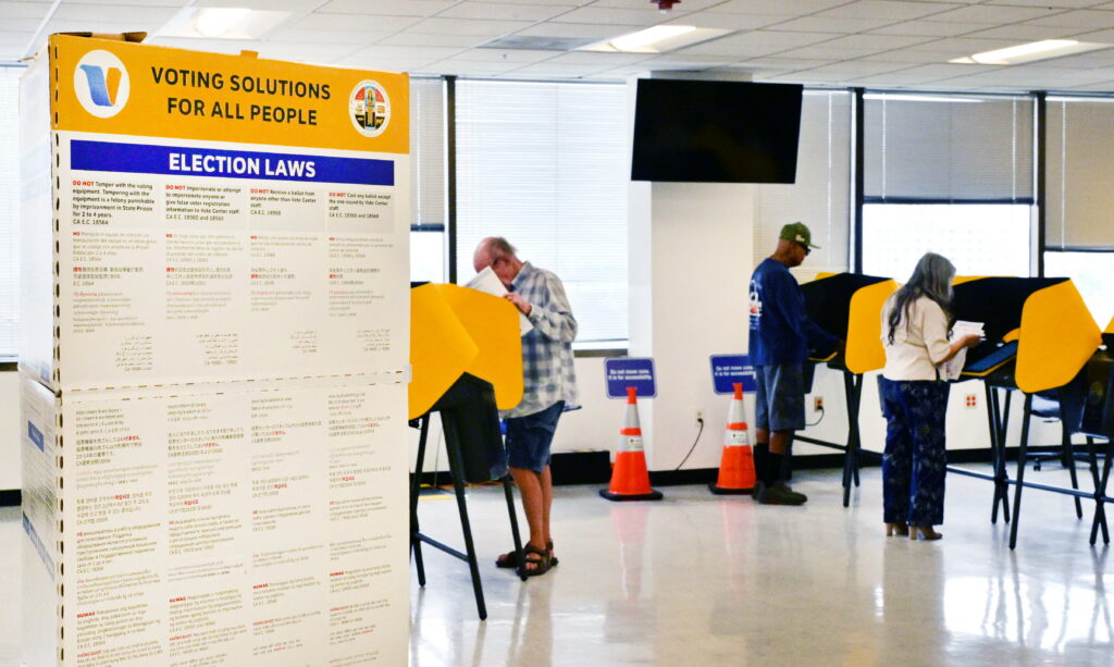 DOJ charges 28 in California with voting crimes as election tensions escalate