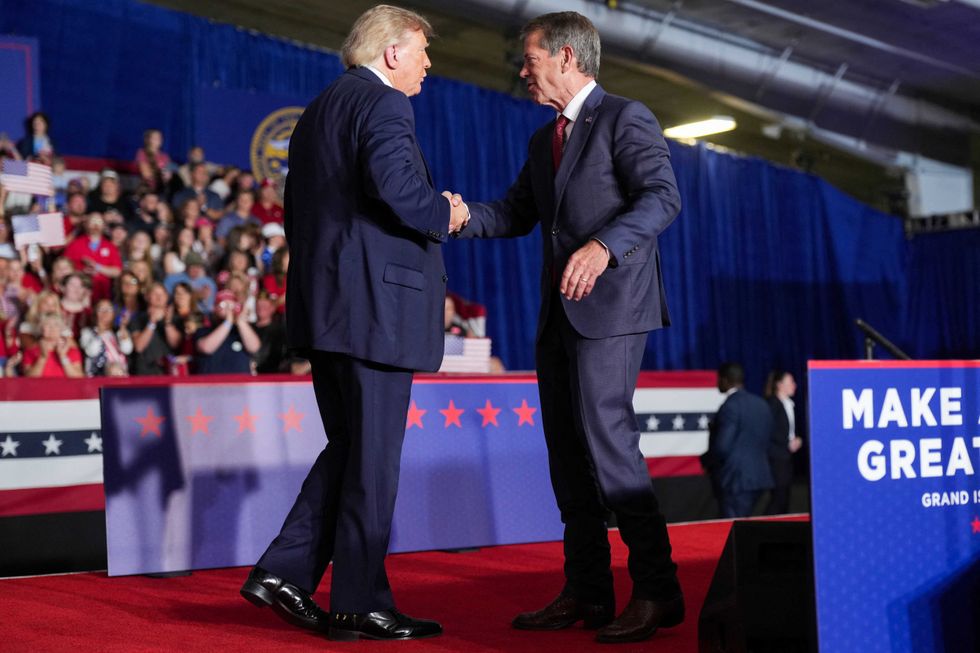 Trump mangles MAGA gov's name to his face as he racks up string of mental flubs at rally