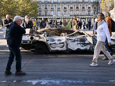 Paris police report 855 arrests after violent clashes and looting during protests