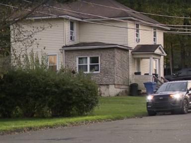Police search home following double homicide at Great Wolf Lodge amid hunt for motive